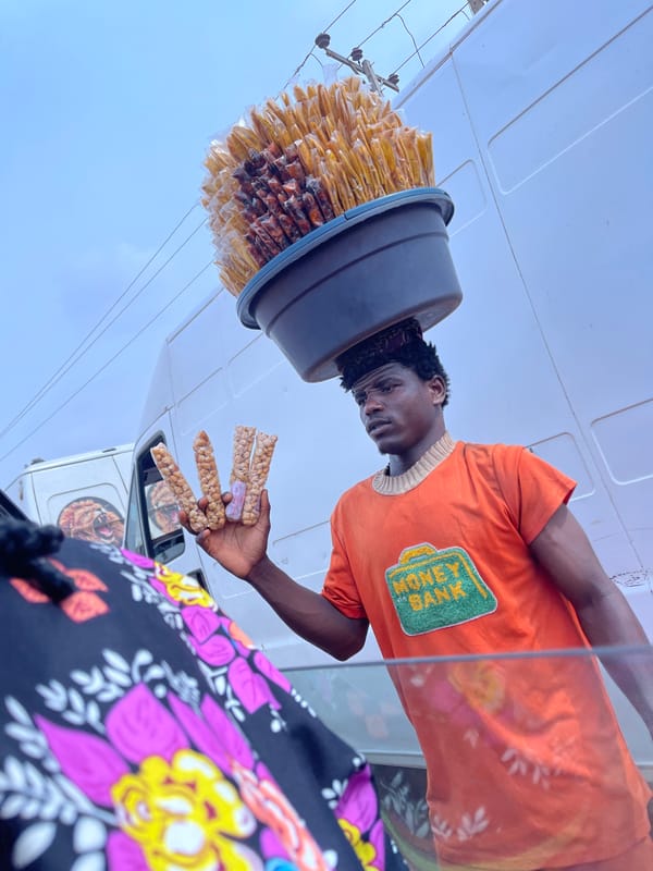 Street vendor conducts business in Ado, Nigeria