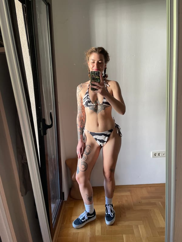 Person takes mirror selfies in Boreti, Montenegro room