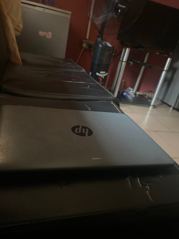 Person with laptop in indoor setting captured over 18 minutes