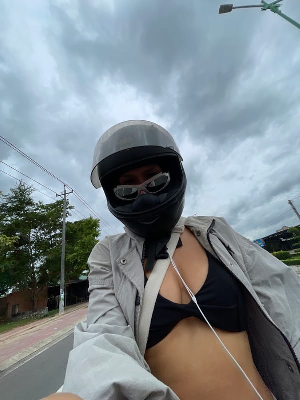 Motorcycle crew rolling through Phu Thuy Ward streets