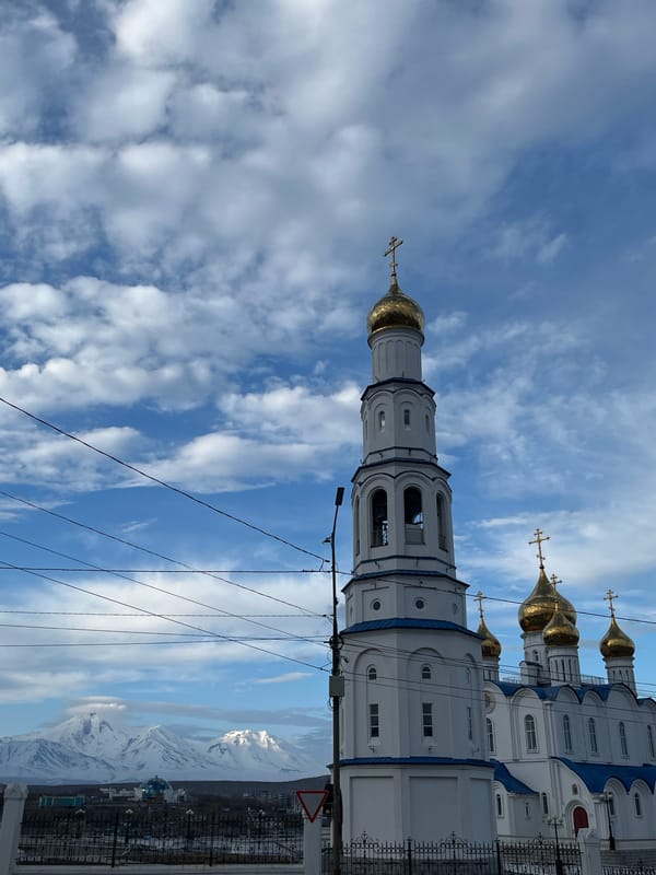 Orthodox cathedral documented in Petropavlovsk-Kamchatsky amid mountain backdrop