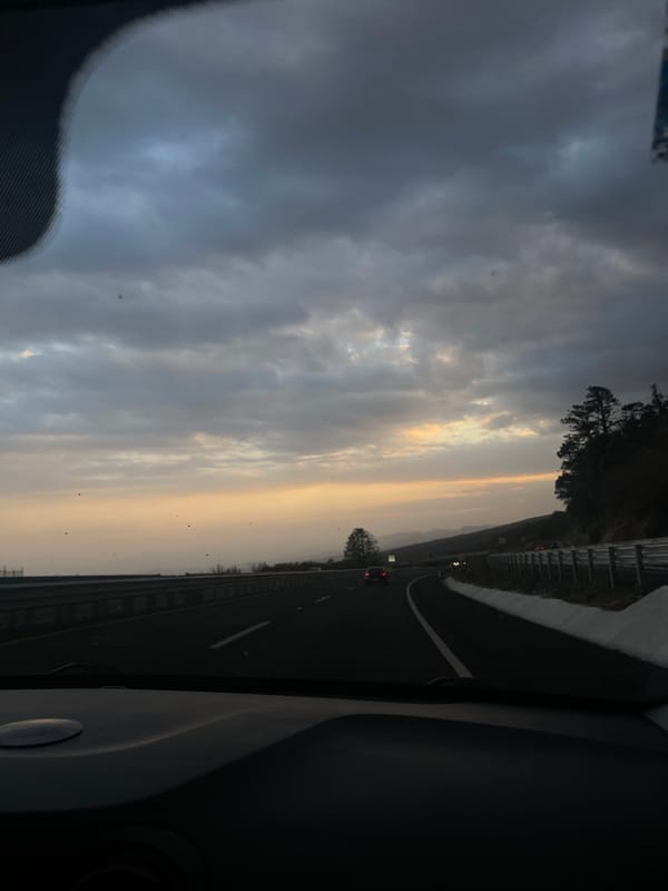 Late night highway travel documented under heavy clouds near Mexico City