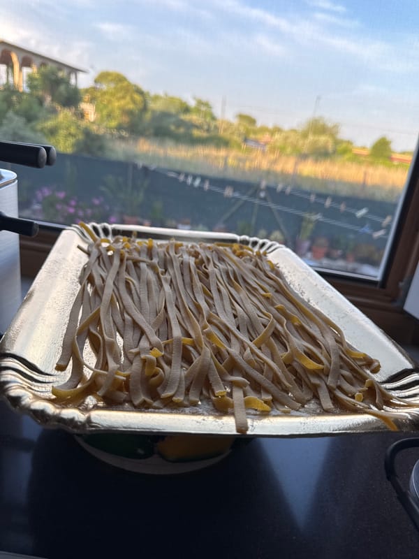 Sunday dinner preparation with fresh pasta in Aprilia home