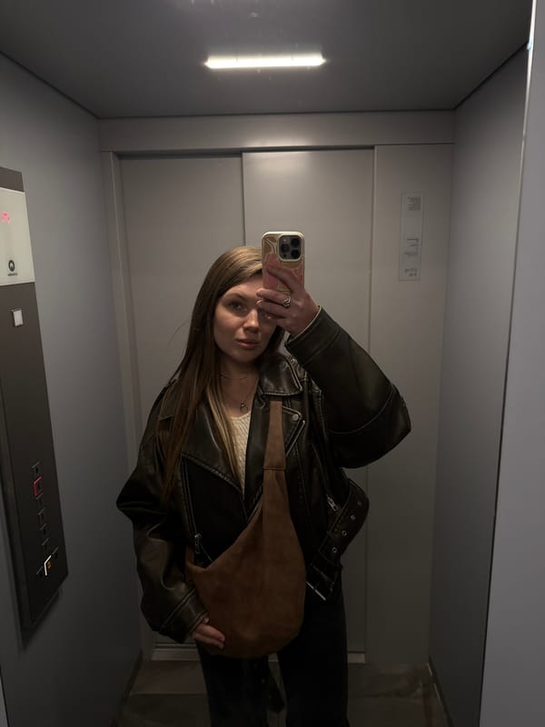 Woman takes selfie in elevator in Belgrade suburb