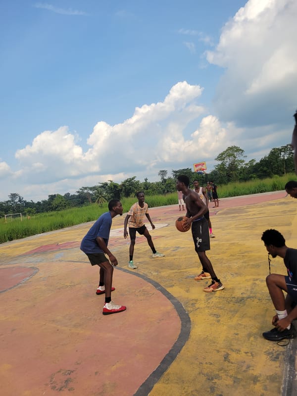Afternoon pickup basketball and street life in Egbagu, Nigeria