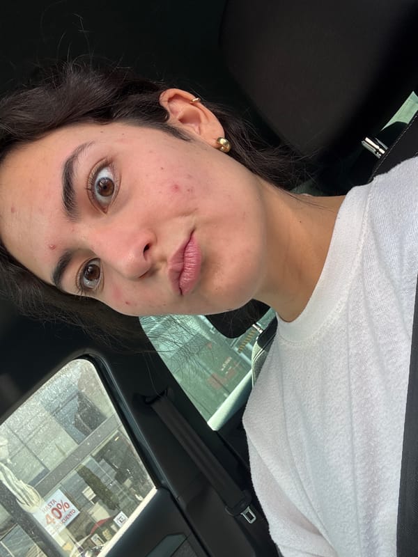 Young woman photographed inside car in Puebla, Mexico