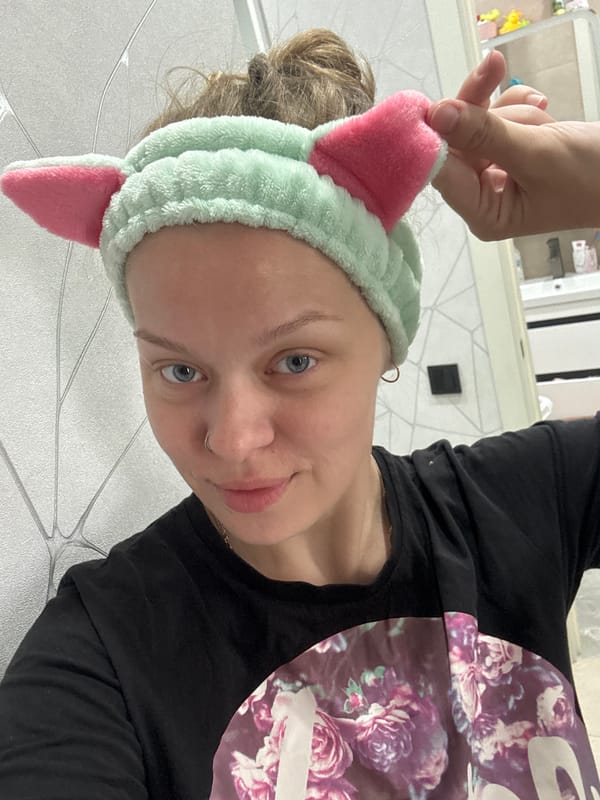 Selfie session at home in Mikhaylovsk, mint cat-ear headband