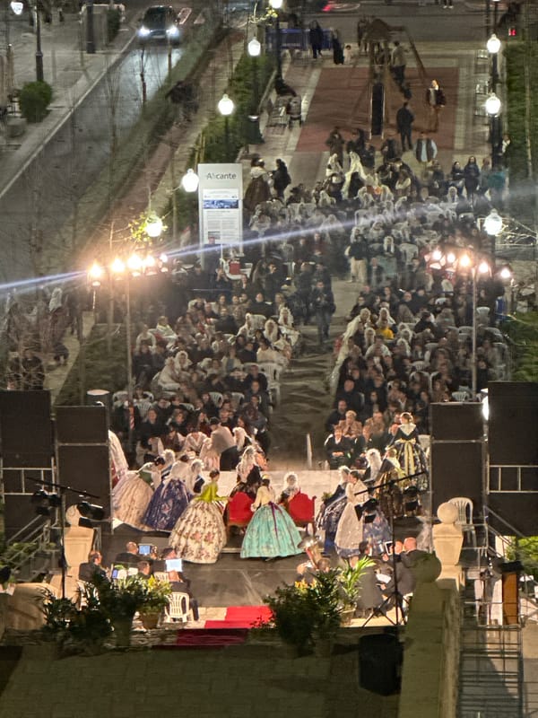 Large crowd gathers around stage in Alicante, Spain