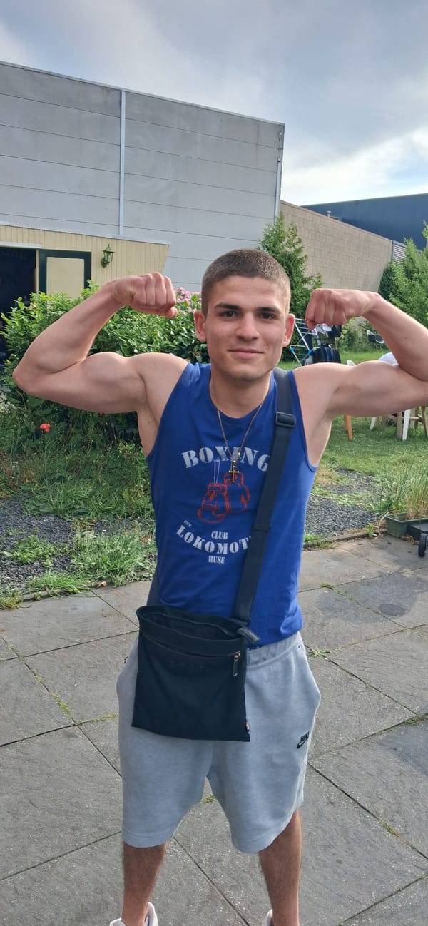 Young boxer displays physique outdoors in Ede, Netherlands