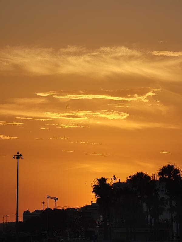 Quarteira beach at golden hour, winding down for the evening