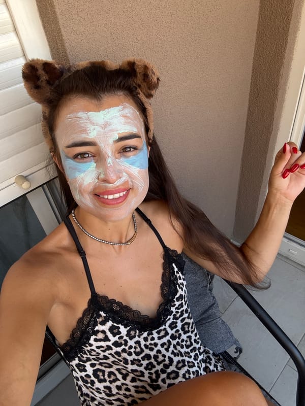 Outdoor face mask routine with a citrus drink in hand