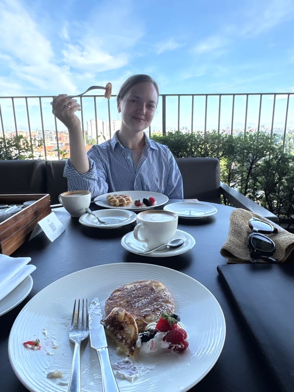 Balcony breakfast with Milan skyline views