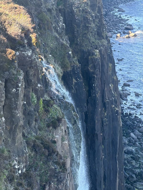 Witness captures Kilt Rock waterfall, coastal waves near Staffin