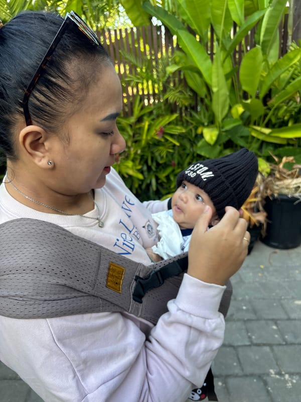 Baby outing in a lush Mengwi garden setting