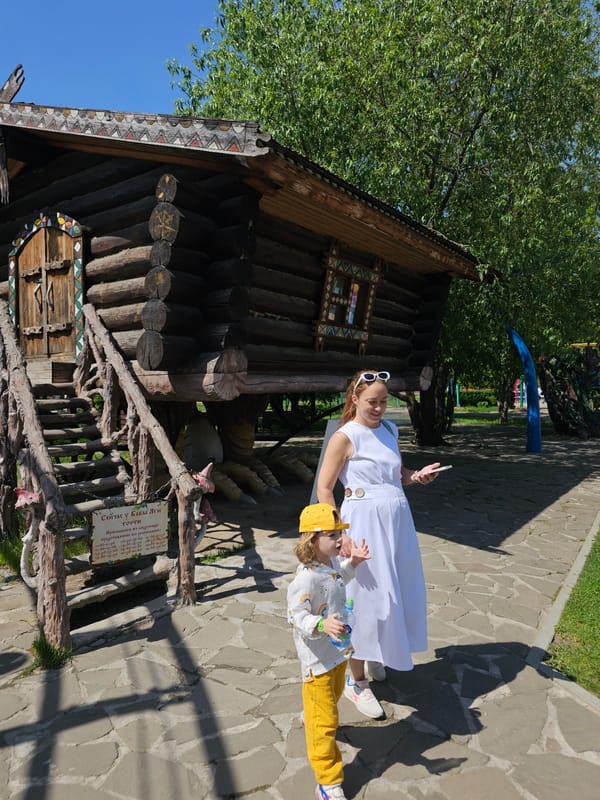 Woman, child visit fairytale house structure in Khimki