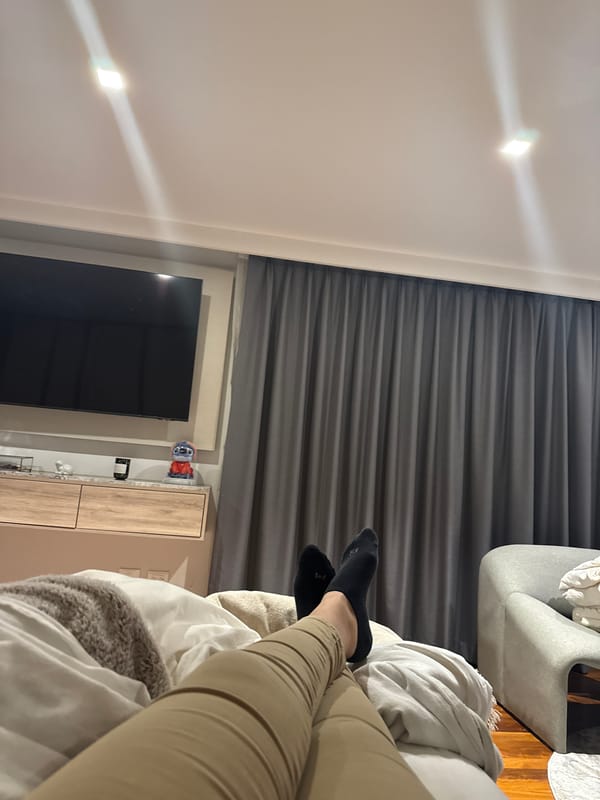Person rests in bedroom in Tlaxcalancingo, Mexico early morning