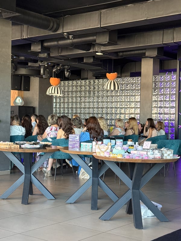 Event morning at a Kryvyi Rih venue with food, drinks, and city views