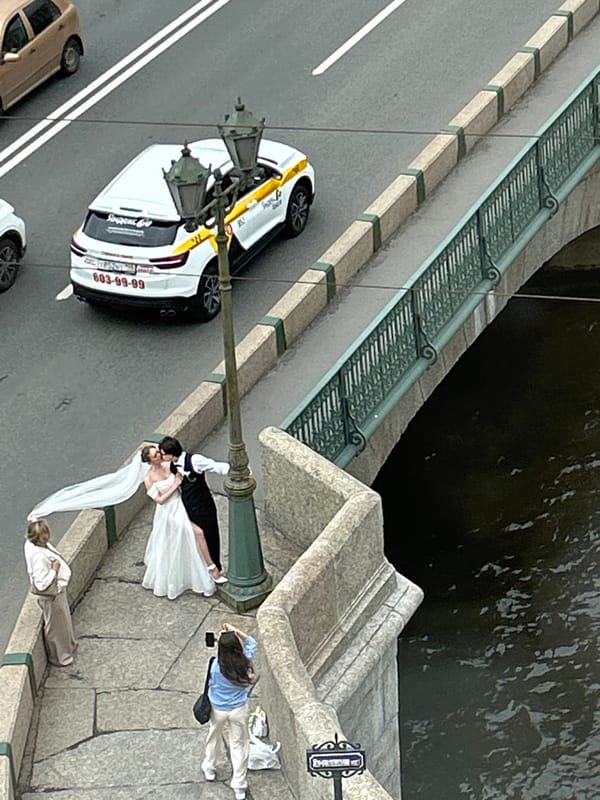 Wedding shoot on a stone bridge canal street