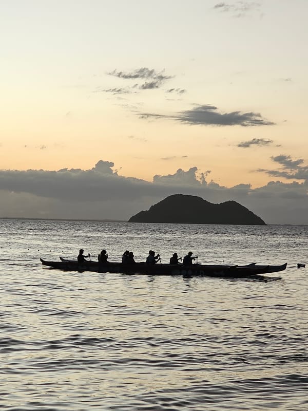 Evening boats silhouetted against sunset in Armação Dos Búzios