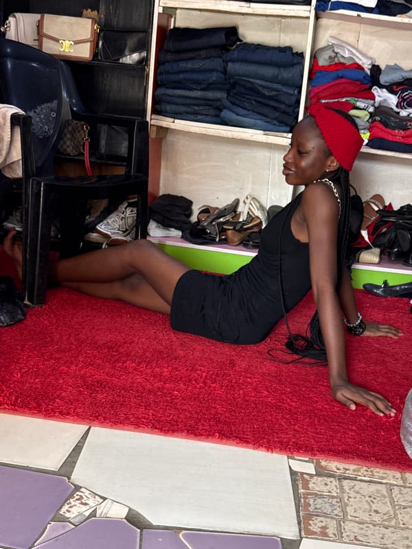 Woman in red headband photographed shopping, relaxing in Abuja