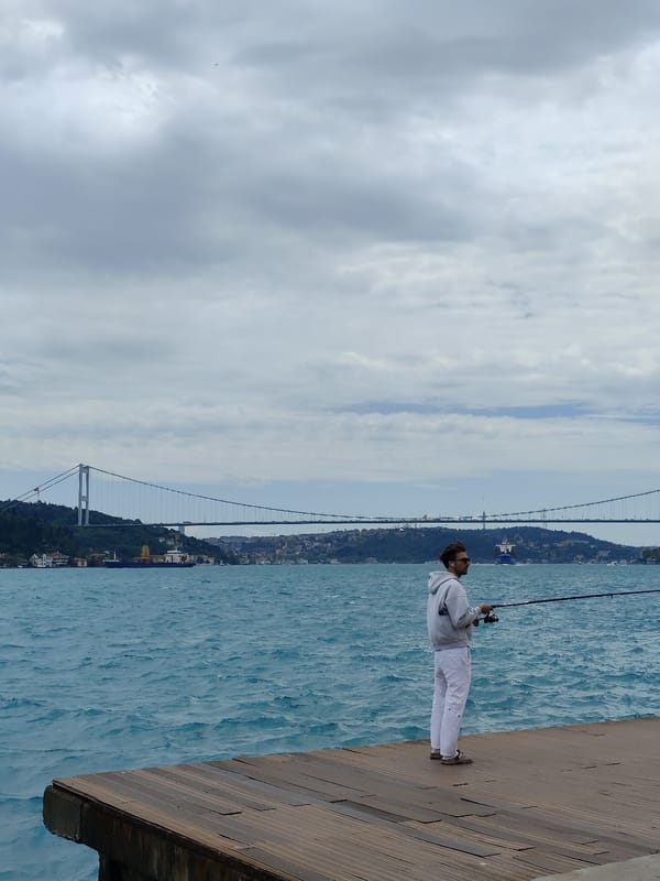 Morning waterfront life captured along Bosphorus in Sarıyer, Turkey