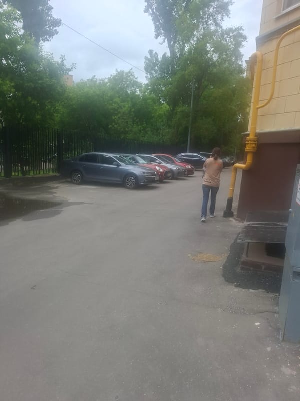 Quiet Moscow residential street with playground and scooters