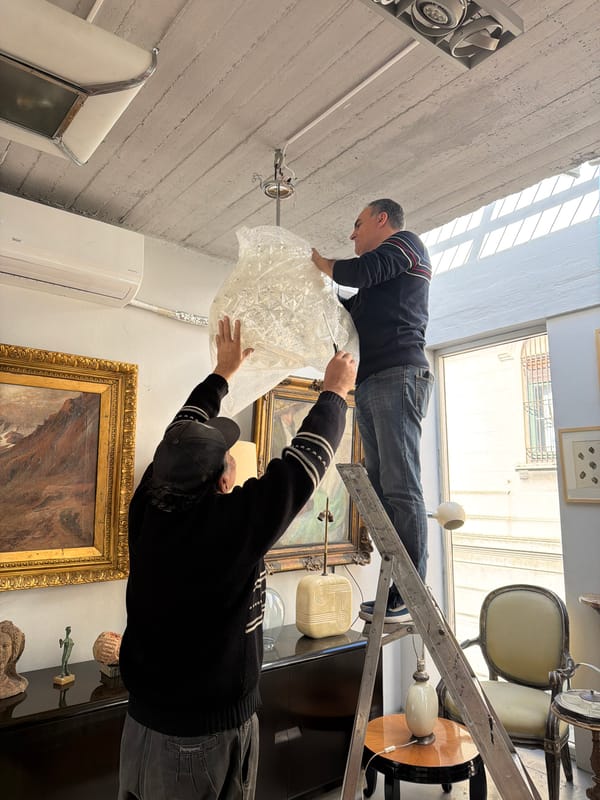 Workers spotted renovating cluttered Buenos Aires shop interior