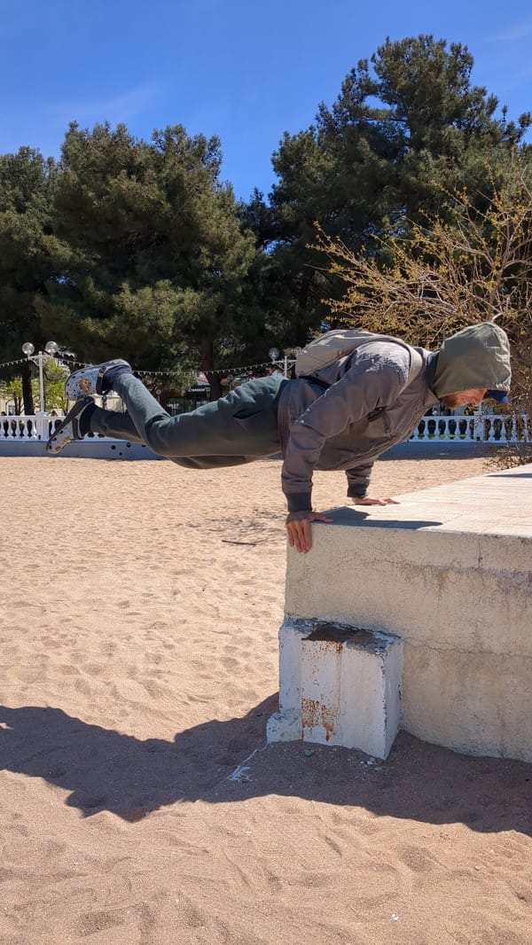Man leans against concrete structure in sunny Gelendzhik