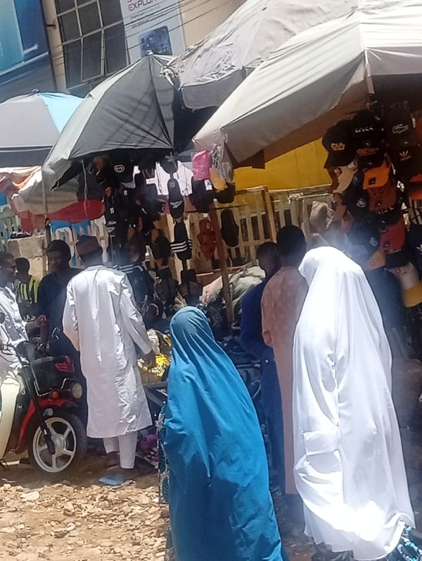 Ordinary market day documented in Nigerian towns