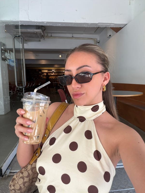 Woman with iced coffee spotted in Seoul early morning