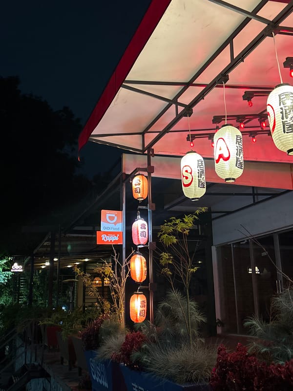 Japanese lantern restaurant illuminated at night in Cholula, Mexico