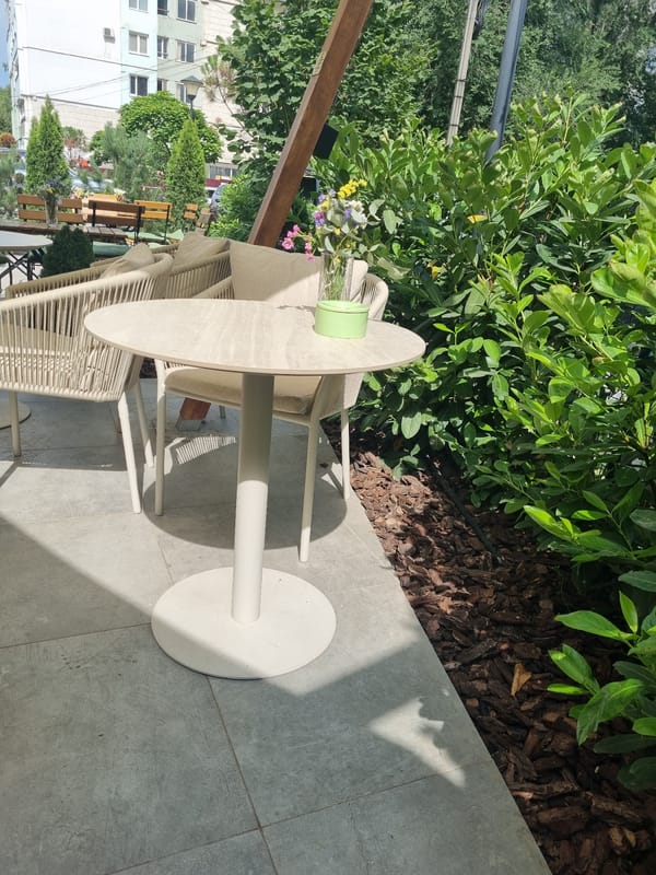 Outdoor patio seating at the Elite building