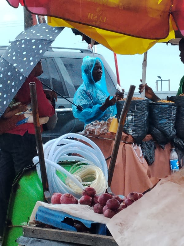 Rainy day street life continues in Aba, Nigeria