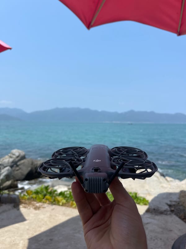 Drone operator photographed with equipment near Vietnamese coast