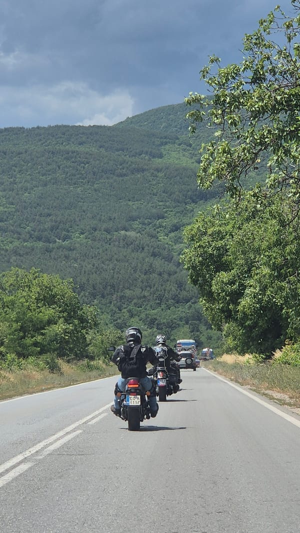 Motorcycle group rolling through rural roads near Gurkovo, Bulgaria