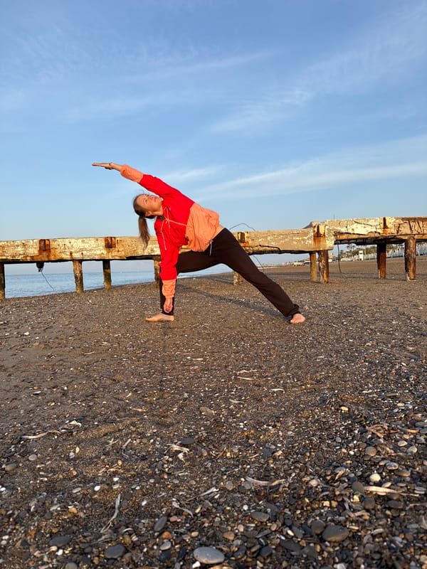 Dawn yoga session captured on Serik beach, Turkey