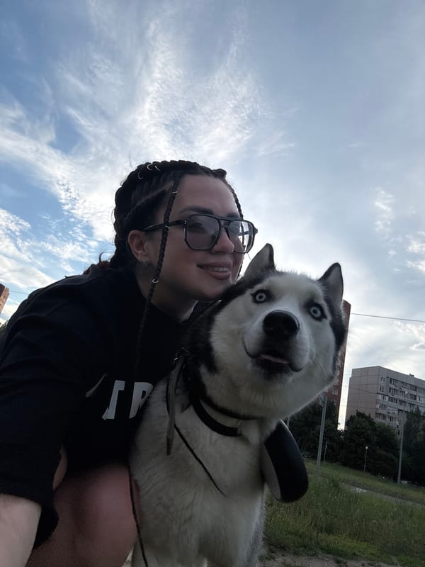 Cats, a husky, wildflowers, and city skies on a June afternoon