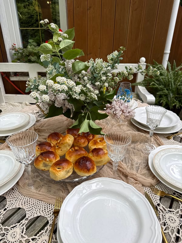 Outdoor dining gathering documented in Sapronovo with grazing horses nearby
