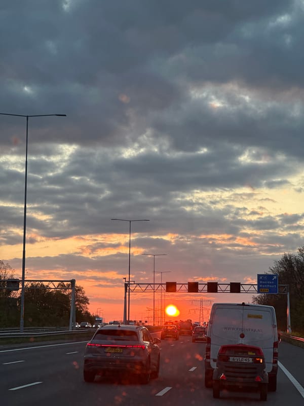 Dramatic sunset observed over congested highway in Woerden
