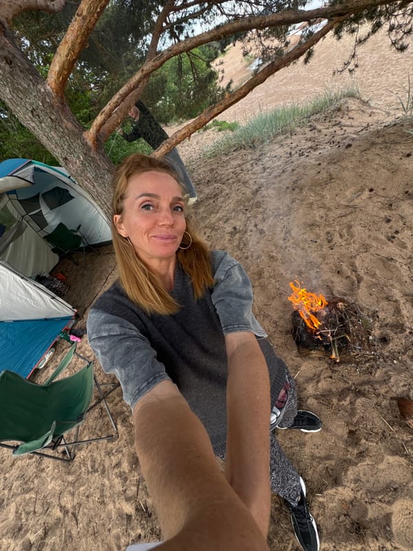 Woman documents beach camping trip in Zelenaya Roshcha, Russia