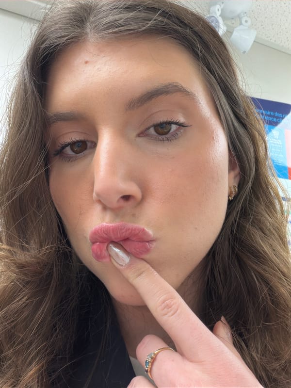 Woman takes selfie with duck face pose in Longueuil