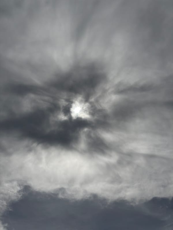 Child plays chef with toy kitchen utensils in Luxembourg