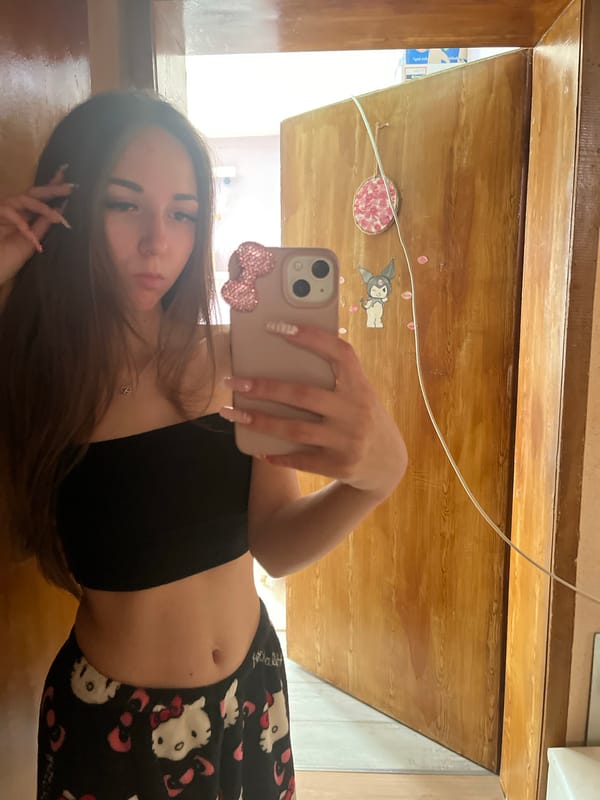 Woman takes selfie in home setting in Ivanyane, Bulgaria