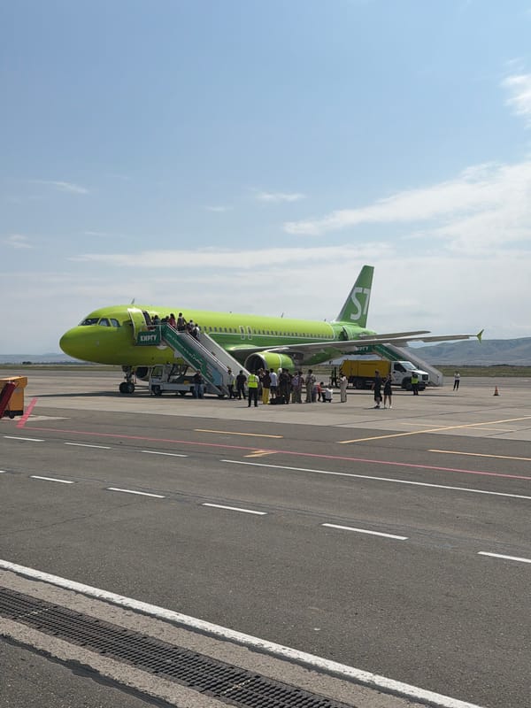 S7 Airlines A320 boarding at Kaspiysk airport