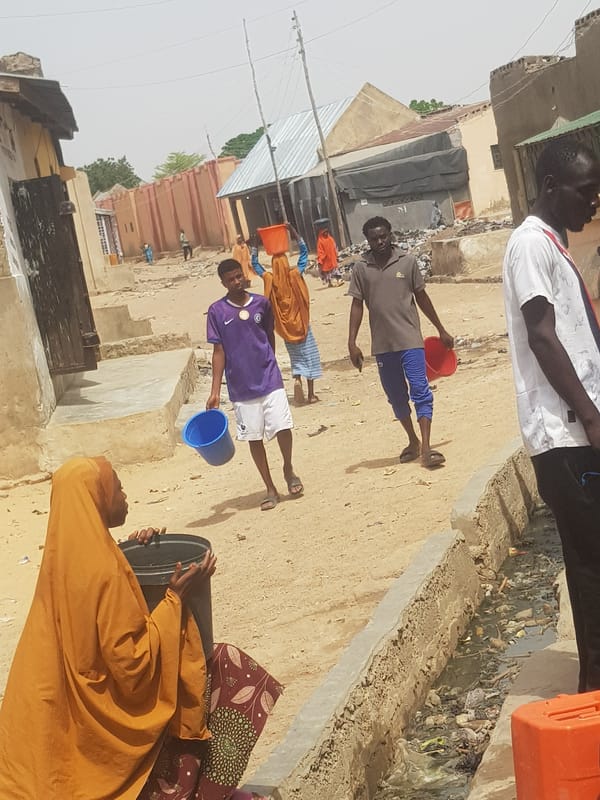 Daily life documented in Nigerian town during morning hours