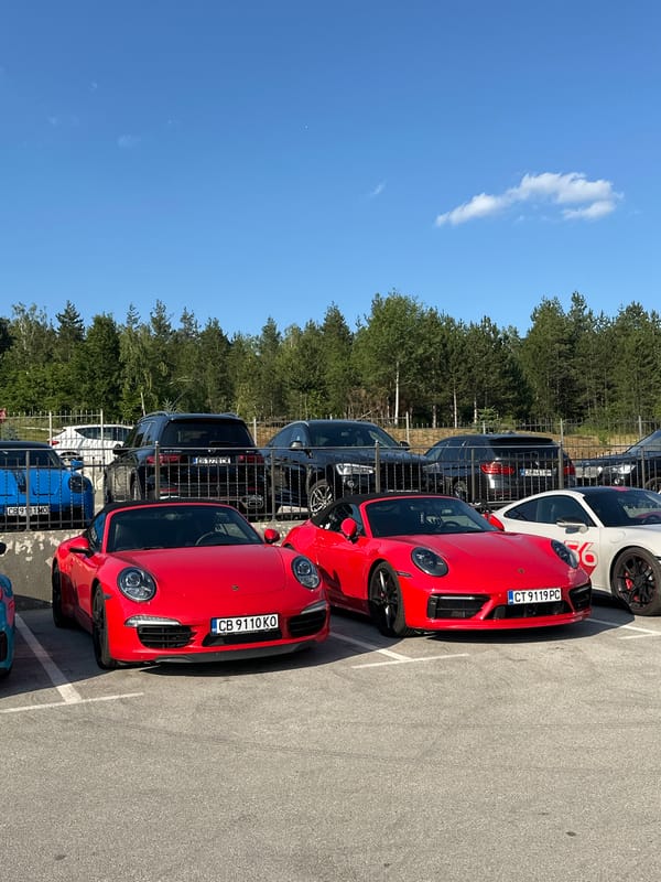 Dozens of Porsches parked up at a Bulgarian hotel meetup