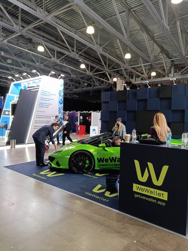 Green Lamborghini convertible displayed at WeWallet exhibition space