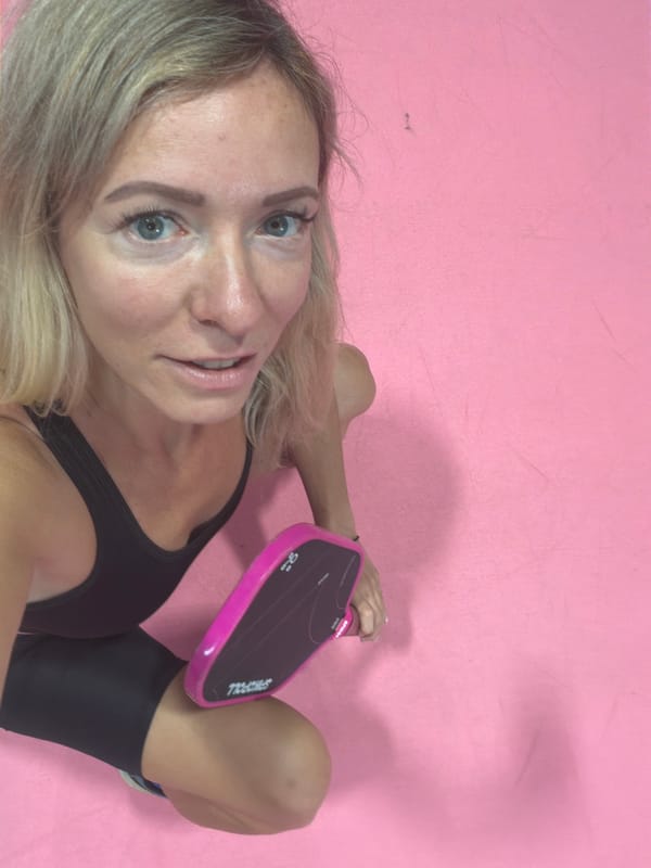 Pickleball court selfies at an indoor venue in Da Lat