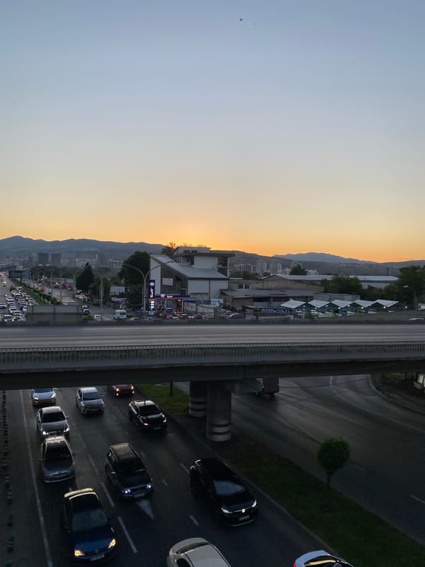 Tbilisi rooftop views at sunset, highway to industrial edge