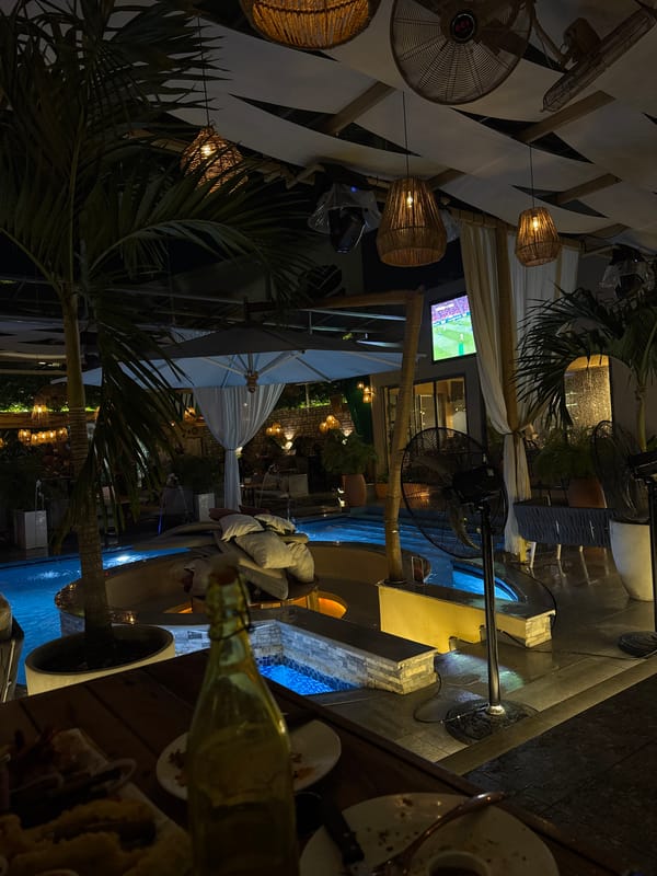 Evening poolside dining captured at Nigerian restaurant